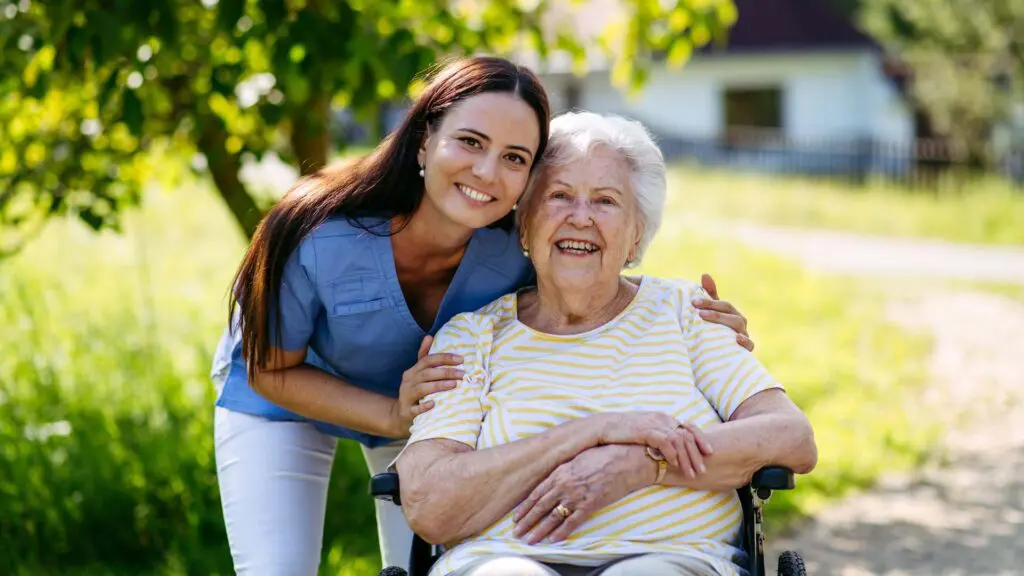 Home,Nurse,Taking,Care,Of,Elderly,Woman,In,Wheelchair.